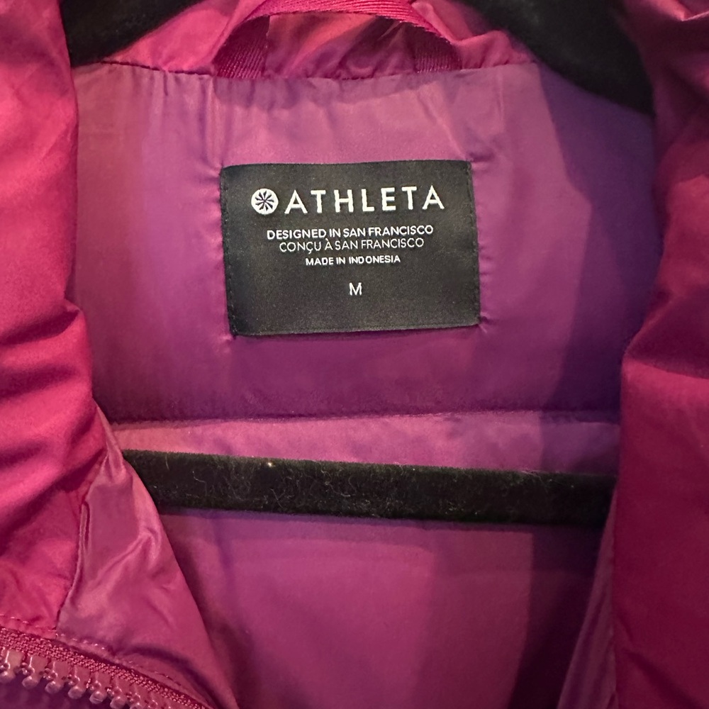 Beautiful purple only worn once Athleta jacket. PICTs looks pink but it’s purple